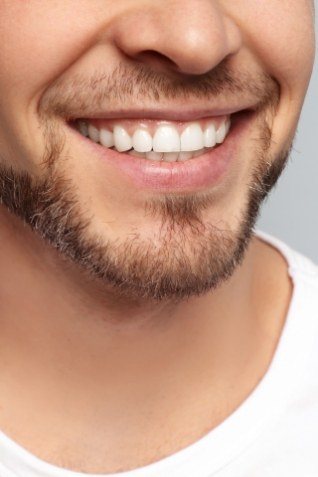 Close up of man with short beard smiling